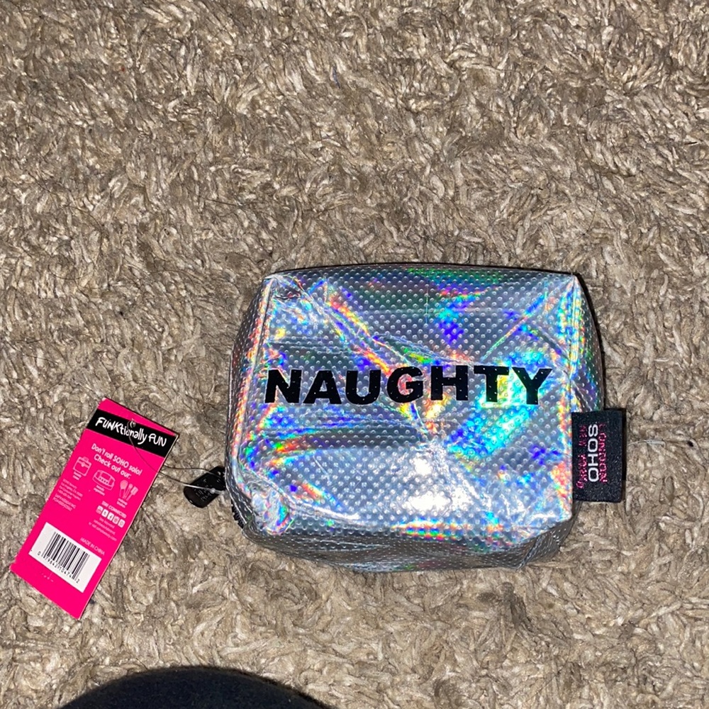 NWT soho make up bag one side says NICE & the other NAUGHTY